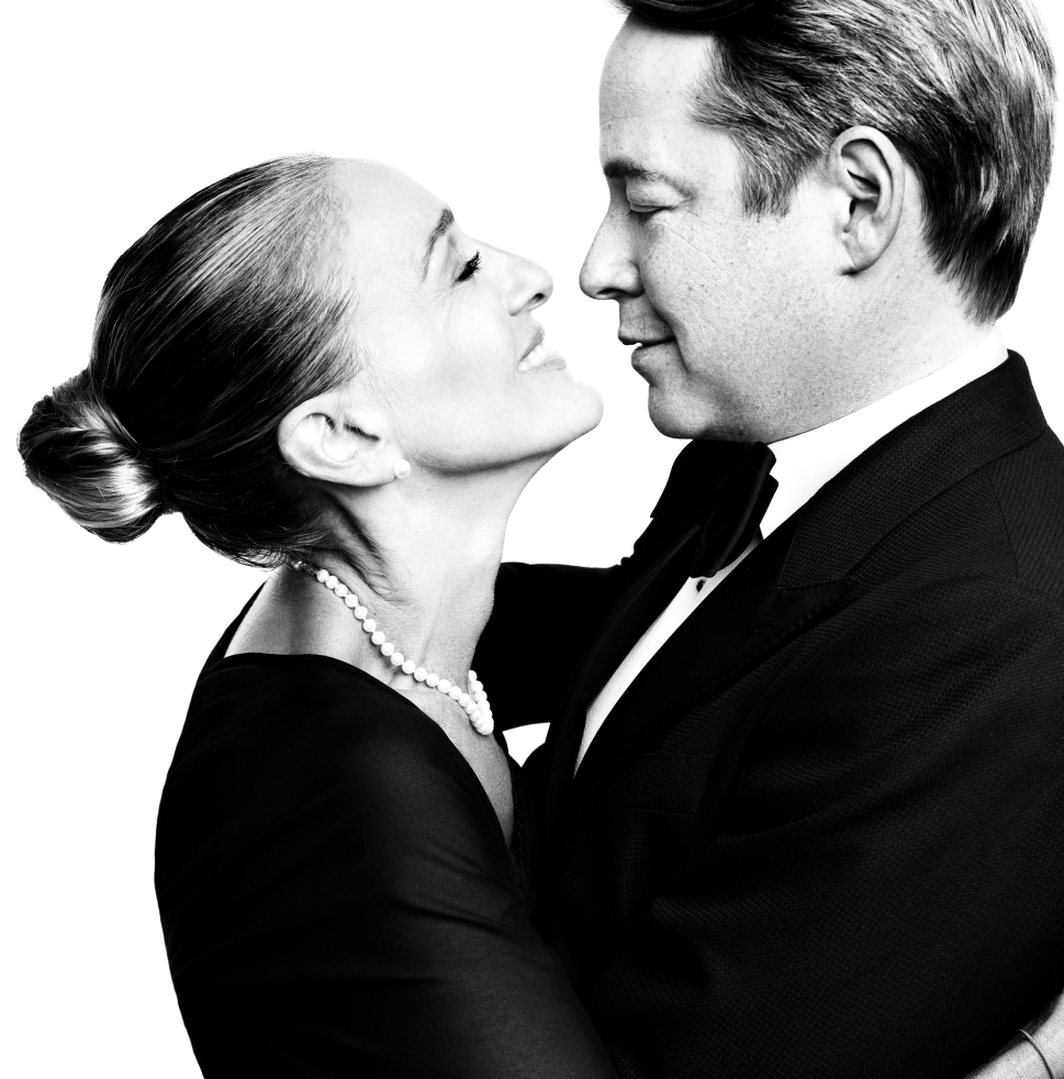 Black and white image of Sarah Jessica Parker and Matthew Broderick. They are both wearing black tie attire and embracing, looking into each other's eyes lovingly.